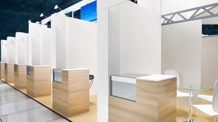 exhibition pavilion interior with workplaces and white wallsの写真素材