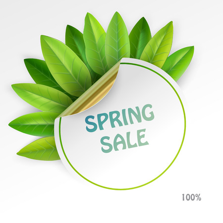 round paper label with golden backside and leaves behindのイラスト素材