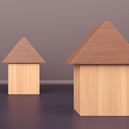 vintage style wooden toy-houses on dark background, conceptual illustrationの写真素材