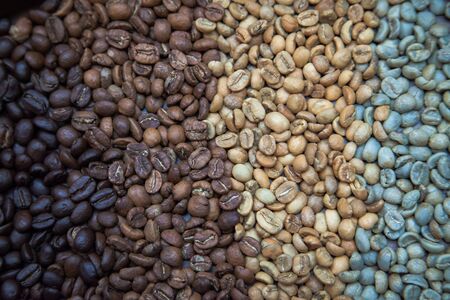 different coffee beans forming beautiful organic textureの写真素材