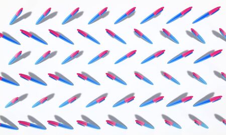 decorative digital background with many plastic pensの写真素材