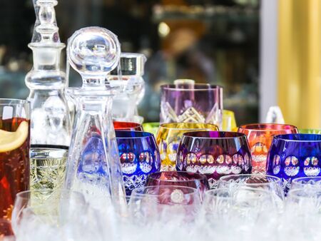 decorative background with old style coorful glass dishes