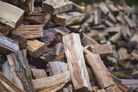 Natural background with huge pile of firewoods close upの写真素材