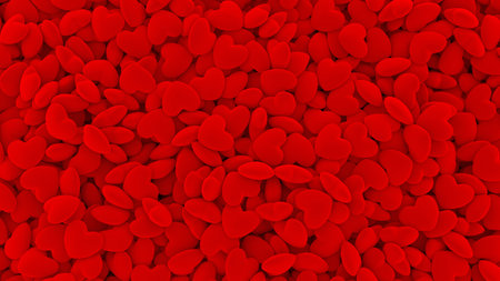 Valentines day festive background with heap of red velvet heartsの写真素材