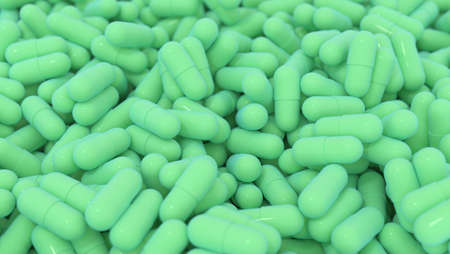 Medical background with heap of fresh green pills