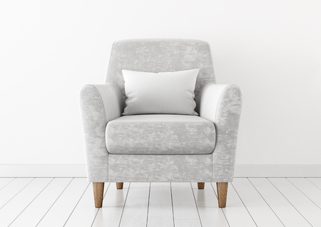 Empty white pillow mock-up with neutral velvet armchair on wooden floor. 3D rendering.の写真素材