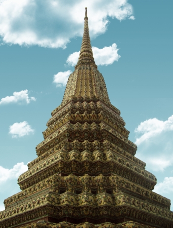 top of buddhistic temple in Thailand faced with colorful mosaic                    の写真素材