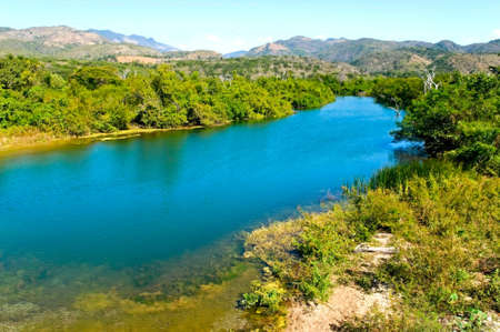 Tropical river near hills, Cubaの写真素材