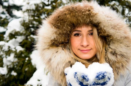 pretty caucasian girl in winter forest