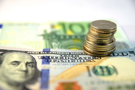 Close up of  Various currency notes and coins from different countries