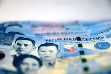 Close up of  Various currency notes and coins from different countriesの写真素材