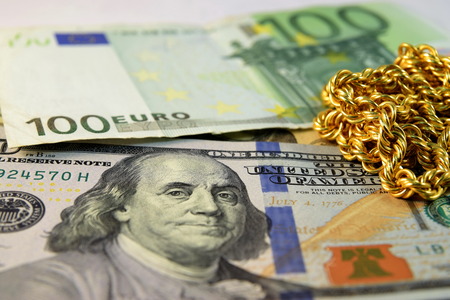 Close up of  Various currency notes and coins from different countries