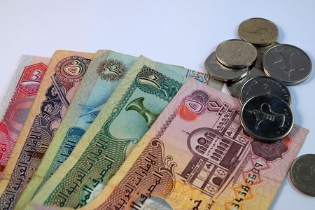 Close up of  Various currency notes and coins from United Arab Emirates