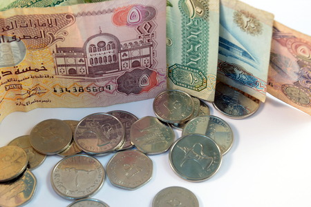 Close up of  Various currency notes and coins from United Arab Emirates