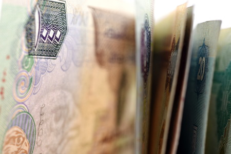 Close up different Dirhams currency note and coins, United Arab Emirates  Close up different Dirhams...
