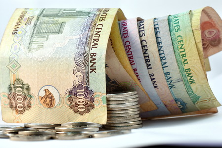 Close up different Dirhams currency note and coins, United Arab Emirates