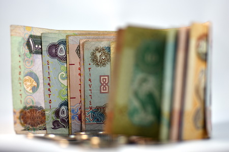 Close up different Dirhams currency note and coins, United Arab Emiratesの写真素材