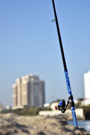Fishing rod in Hamriyah free zone port, Ajman, United Arab Emiratesの写真素材