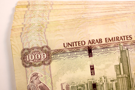 Close up Dirhams currency note and coins, AED, United Arab Emiratesの写真素材