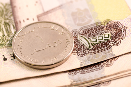 Close up Dirhams currency note and coins, AED, United Arab Emiratesの写真素材