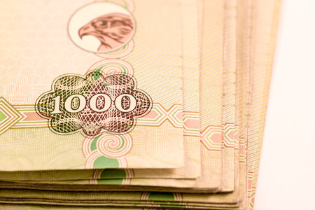 Close up Dirhams currency note and coins, AED, United Arab Emiratesの写真素材