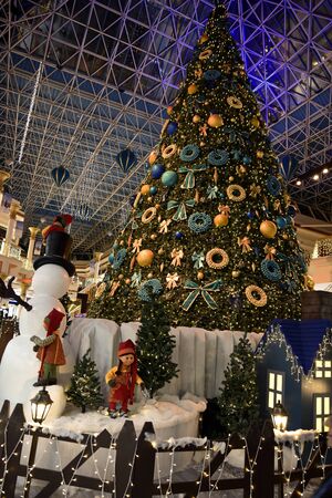Wafi city Mall, Dubai, United Arab Emirates, December 23, 2018, Christmas Activity in the mall for the kids to take picture with Santa Claus and Christmas treeのeditorial素材