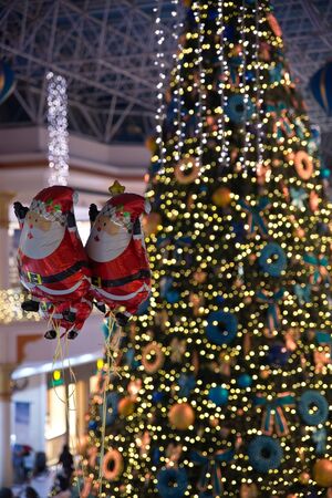 Wafi city Mall, Dubai, United Arab Emirates, December 23, 2018, Christmas Activity in the mall for the kids to take picture with Santa Claus and Christmas treeのeditorial素材