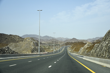New Dubai -  Fujairah Road, Sheikh Khalifa Bin Zayed Road, Ras Al Khaimah â Fujairah, United Arab Emirates, June 4, 2019. Around 40 minutes make shorter Dubai to Fujairah.のeditorial素材
