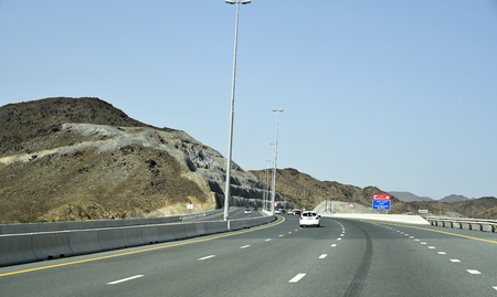 New Dubai -  Fujairah Road, Sheikh Khalifa Bin Zayed Road, Ras Al Khaimah â Fujairah, United Arab Emirates, June 4, 2019. Around 40 minutes make shorter Dubai to Fujairah.のeditorial素材