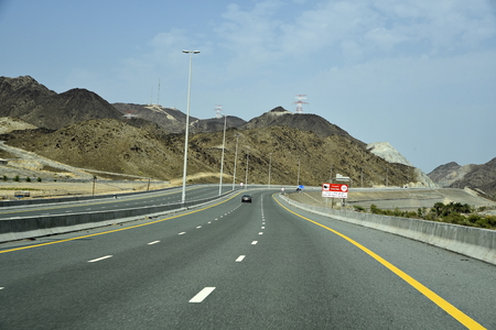 New Dubai -  Fujairah Road, Sheikh Khalifa Bin Zayed Road, Ras Al Khaimah â Fujairah, United Arab Emirates, June 4, 2019. Around 40 minutes make shorter Dubai to Fujairah.のeditorial素材