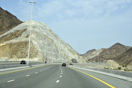 New Dubai -  Fujairah Road, Sheikh Khalifa Bin Zayed Road, Ras Al Khaimah â Fujairah, United Arab Emirates, June 4, 2019. Around 40 minutes make shorter Dubai to Fujairah.のeditorial素材
