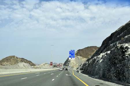 New Dubai -  Fujairah Road, Sheikh Khalifa Bin Zayed Road, Ras Al Khaimah â Fujairah, United Arab Emirates, June 4, 2019. Around 40 minutes make shorter Dubai to Fujairah.のeditorial素材
