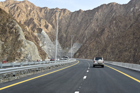 New Korfakan â Dubai, Sharjah road, Ras Al Khaimah â Fujairah, United Arab Emirates, June 4, 2019. Included many tunnels in the mountainsのeditorial素材
