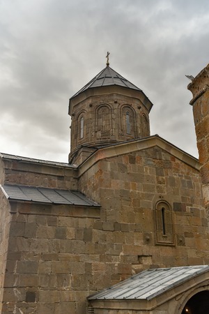 Gergeti Trinity Church on the top of mountains, near Village of Kazbegi, the one the nice tourist spot, historical and nature, October 19, 2019, Kazbegi, Republic of Gerogiaのeditorial素材