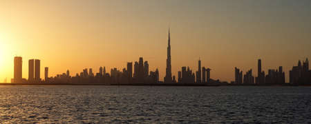 Dubai slyline from Dubai Creek Harbour and Dubai canal to Downtown and Business Bay, United Arab Emiratesのeditorial素材