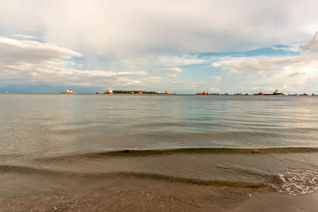 Labuan, Malaysia-June 06, 2021: beach View of the city of Labuan island, Malaysia, Labuan town is the capital of the Federal Territory of Labuan in Malaysia.のeditorial素材