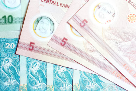A high-quality, top-down view of United Arab Emirates currency (AED), featuring a mix of colorful...