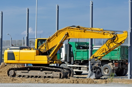 Construction site. Excavator and dumper