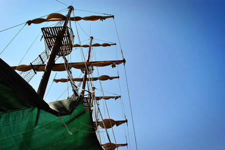 green ship in front of the skyの写真素材