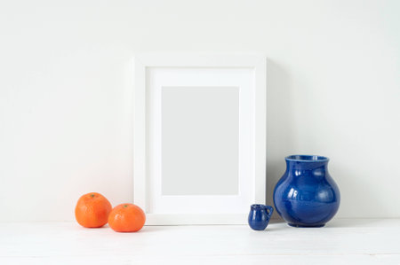 Minimal elegant composition with tangerines and vaseの写真素材