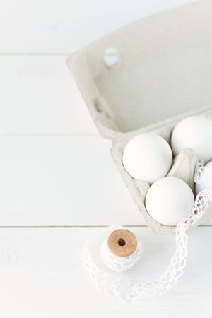 Easter eggs on white wooden backgroundの写真素材