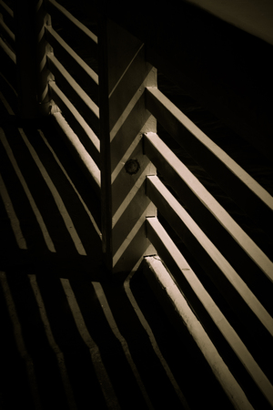 Light shadow on railing timber in black and whiteの写真素材