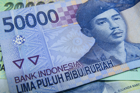 Mixed Indonesian banknotes in a close-up picture