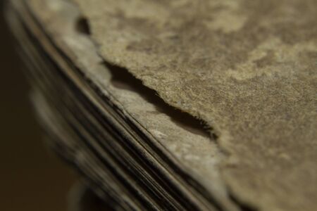 Macro shot old vintage book papers edge shape and textureの写真素材