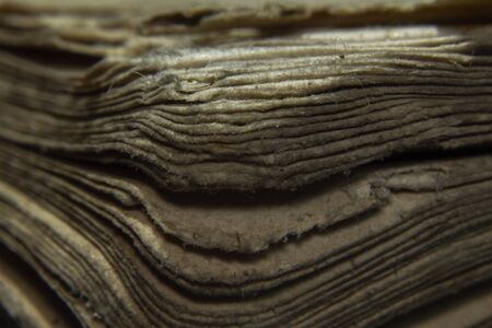 Macro shot old vintage book papers edge shape and textureの写真素材