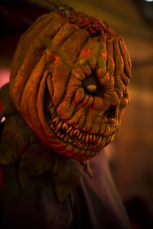 Halloween pumpkin with a scary evil faceの写真素材