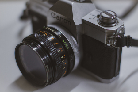 Old vintage Canon SLR camera, Vintage Canon FTB QL 35mm Film SLR Camera W/ FD 50mm F/1.8 Lensのeditorial素材
