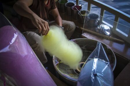 Cotton candy in the making at a busy street food