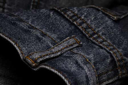 A close-up picture of crinkle blue jeansの写真素材