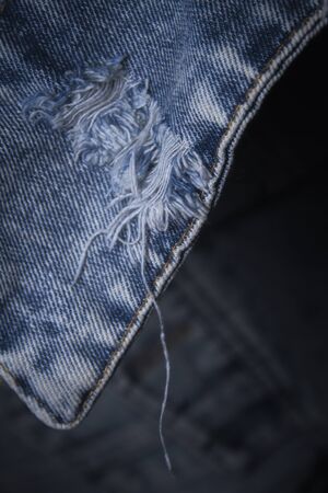 Close-up popular trend ripped jeans or distressed jeansの写真素材